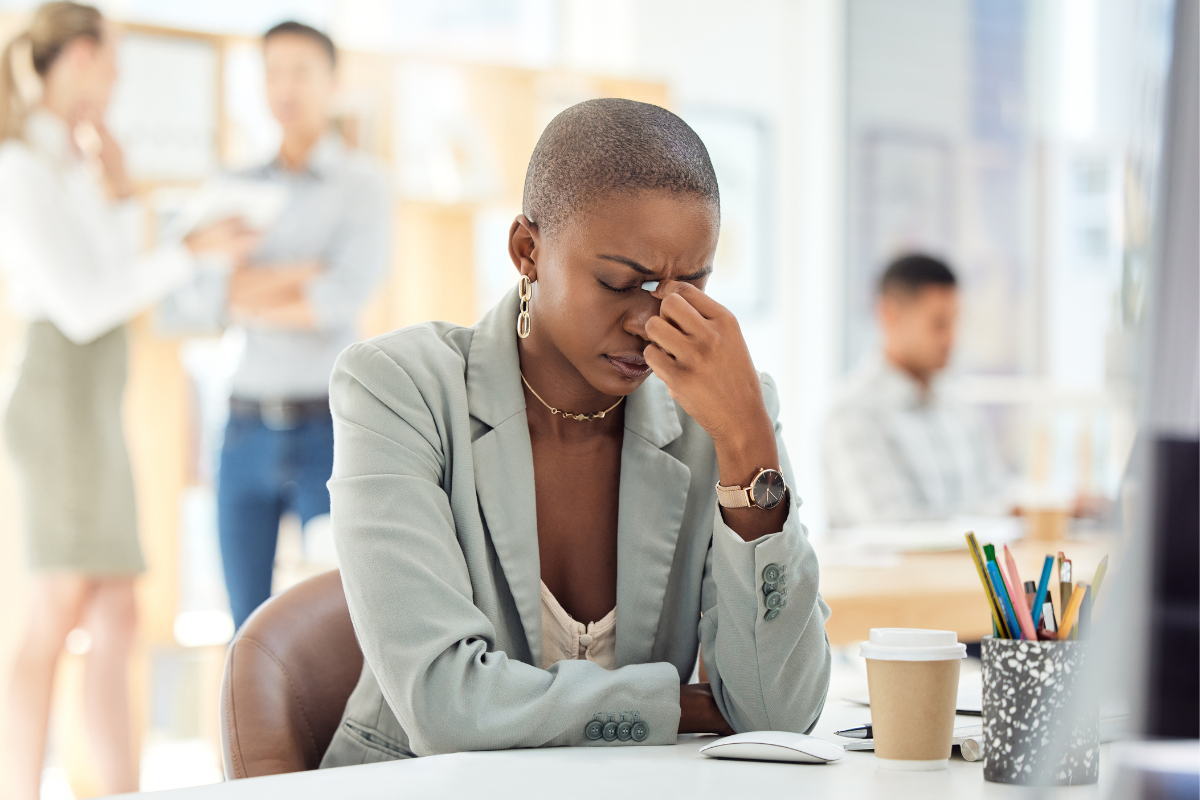 Stressed woman sitting at desk