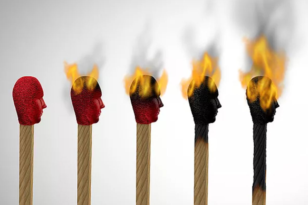 A row of five matches, each burning a little more. The tip of each match is shaped like the silhouette of a head.