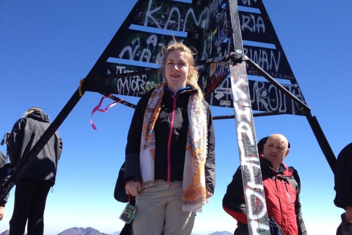 Nicola Jagielski stands at the summit of Mount Toubkal in Morroco